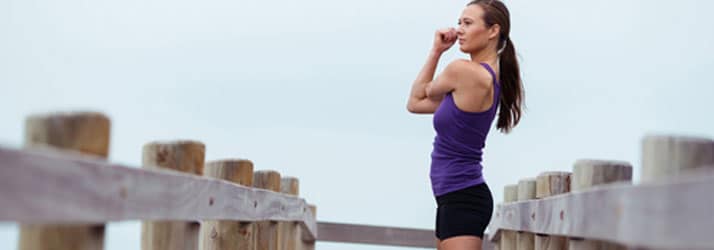 Woman Stretching Before A Run